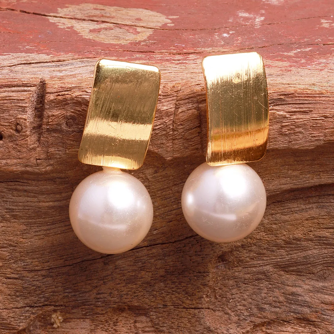 Striking Gold Rectangular Earrings Accented With A Chic Pearl.